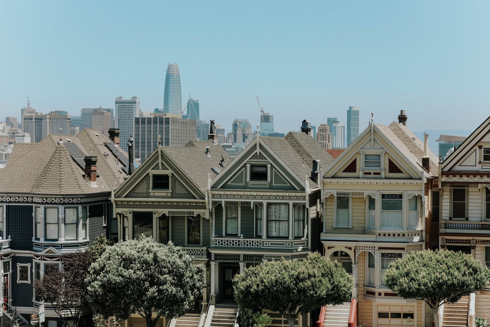 Colorful Victorian houses on a quiet residential street